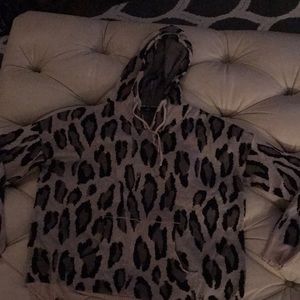 Distressed leopard sweater